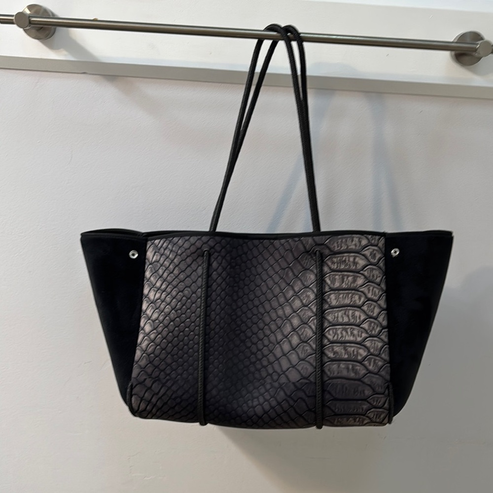 Haute Shore skin print neoprene bag.